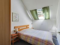 a bedroom with a bed and a window at Appartement Luz-Saint-Sauveur, 3 pièces, 6 personnes - FR-1-402-44 in Luz-Saint-Sauveur
