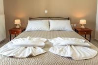 A bed or beds in a room at Vigere Luxury Villa