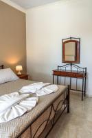 A bed or beds in a room at Vigere Luxury Villa