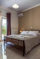 A bed or beds in a room at Vigere Luxury Villa
