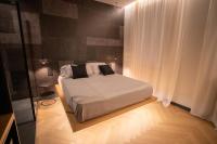 Łóżko lub łóżka w pokoju w obiekcie S1 Luxury Suites and Rooms