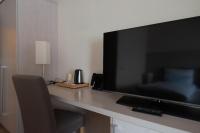 TV a/nebo společenská místnost v ubytování Best Western Plus Theodor Storm Hotel