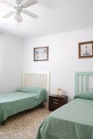 Postel nebo postele na pokoji v ubytování VILLA PEPUCHO 3