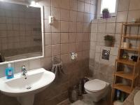 Kúpeľňa v ubytovaní Ede Apartman