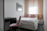 Postel nebo postele na pokoji v ubytování Zagreb City Apartments