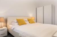 Postel nebo postele na pokoji v ubytování Zagreb City Apartments