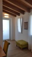 A bed or beds in a room at Agriturismo Resort Il Foionco