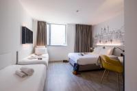 B&B Hotel Budapest Cityにあるベッド
