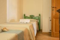 Posteľ alebo postele v izbe v ubytovaní Casa Gallo