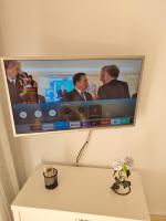 Televízia a/alebo spoločenská miestnosť v ubytovaní Chez Vida Vera Playa nudista