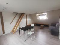 Część wypoczynkowa w obiekcie Appartement mezzanine aux portes de Rennes
