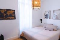 Posteľ alebo postele v izbe v ubytovaní Appartement Design 5 stars Avec Terrasse Et Parking Cannes by Halldis