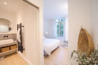Posteľ alebo postele v izbe v ubytovaní Appartement Design 5 stars Avec Terrasse Et Parking Cannes by Halldis