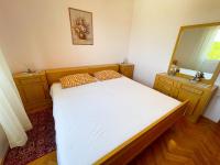 Posteľ alebo postele v izbe v ubytovaní Apartman Asta