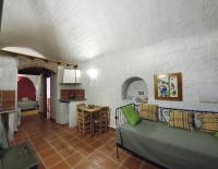 Posezení v ubytování Casas Cueva y Cortijo La Tala en Guadix