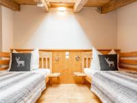 Postel nebo postele na pokoji v ubytování Green Garden Lodge B3