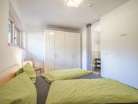A bed or beds in a room at Haus Rabl Dan