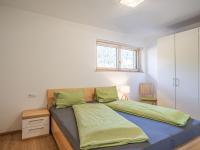 A bed or beds in a room at Haus Rabl Dan