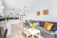 Kuchyňa alebo kuchynka v ubytovaní Apartament WOOD SurfingBird Dźwirzyno
