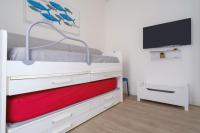 A bed or beds in a room at Appartamento Fico D'india