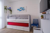 A bed or beds in a room at Appartamento Fico D'india