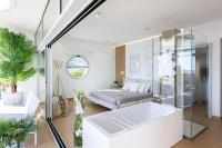 Posteľ alebo postele v izbe v ubytovaní Ensuite Deluxe Jacuzzi & Parking Privado