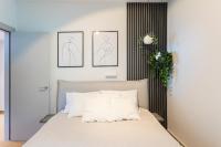 Posteľ alebo postele v izbe v ubytovaní Ensuite Deluxe Jacuzzi & Parking Privado