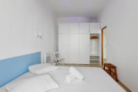 Łóżko lub łóżka w pokoju w obiekcie Appartement Chaudron - Welkeys