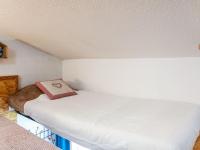 a bedroom with two beds in a room at Studio Rond Point des Pistes-19 by Interhome in Tignes