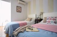 Postel nebo postele na pokoji v ubytování Living4Malaga Reding Superior Apartment