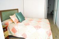 Postel nebo postele na pokoji v ubytování Living4Malaga Reding Superior Apartment