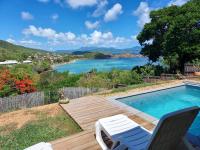 Kolam renang di atau di dekat la villa carib&eacute;enne de la plage des surfeurs