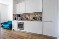 Kuchyňa alebo kuchynka v ubytovaní Sunlit 1 Bedroom Apt Via Pirelli