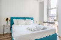 Posteľ alebo postele v izbe v ubytovaní Sunlit 1 Bedroom Apt Via Pirelli