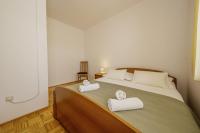 En eller flere senge i et v&aelig;relse p&aring; Martini in Vrsine - Haus f&uuml;r 8 Personen