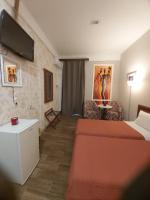 Posteľ alebo postele v izbe v ubytovaní MOTEL KATERINA