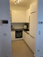 Kuchyňa alebo kuchynka v ubytovaní Apartman ARIA