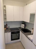 Kuchyňa alebo kuchynka v ubytovaní Apartman ARIA