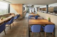 Et opholdsområde på OMO5 Okinawa Naha by Hoshino Resorts