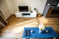 Televízia a/alebo spoločenská miestnosť v ubytovaní A37 Awesome Apartments