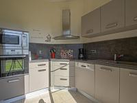 Kuchyňa alebo kuchynka v ubytovaní Comfortable holiday home with garden