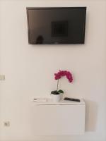 Telewizja i/lub zestaw kina domowego w obiekcie Lina at the best