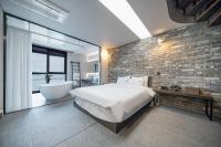 Louis Boutique Hotelにあるベッド