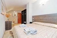 Łóżko lub łóżka w pokoju w obiekcie Gallery Home