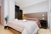 Łóżko lub łóżka w pokoju w obiekcie Gallery Home