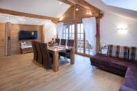 Televízia a/alebo spoločenská miestnosť v ubytovaní Appartement Kichelerhof