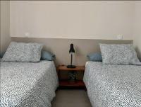 Postel nebo postele na pokoji v ubytování Apartamentos El Piquillo en Cadalso de los Vidrios
