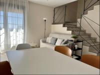 Posezení v ubytování Apartamentos El Piquillo en Cadalso de los Vidrios