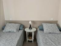 Postel nebo postele na pokoji v ubytování Apartamentos El Piquillo en Cadalso de los Vidrios