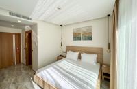 Postel nebo postele na pokoji v ubytování Dna Hotel Dalyan